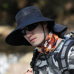 SoraCool Mesh Neck-Flap Trail Hat — black neck-flap trail hat worn on a trail