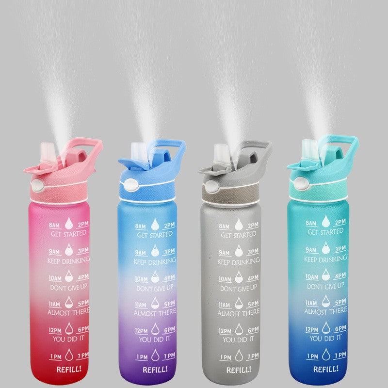 SoraCool Time-Marker Mist Water Bottle — pink, blue-purple, gray and teal bottles standing on a gray studio background